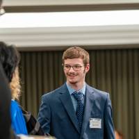 grabbing awards from president